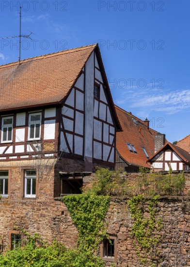 The old town centre with half-timbered houses, church towers and remains of the town wall in Büdingen, Hesse, Germany
