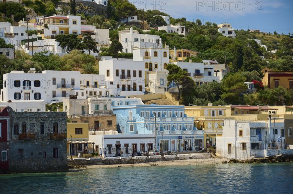 Urban landscape with white and colourful houses on a coast on a hill, Lakki, Leros, Dodecanese, Greek Islands, Greece