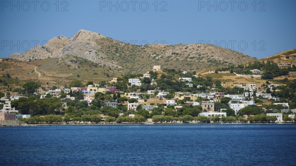 View over a wide coastline with a hill in the background, Lakki, Leros, Dodecanese, Greek Islands, Greece