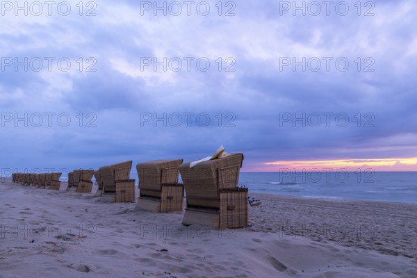 Beach chairs at sunset, North Sea, Rantum, Sylt, Schleswig-Holstein