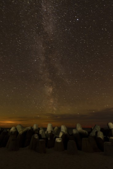Northern Lights with Milky Way at the North Sea, Hörnum, Sylt, Tetrapode (stone), Schleswig-Holstein