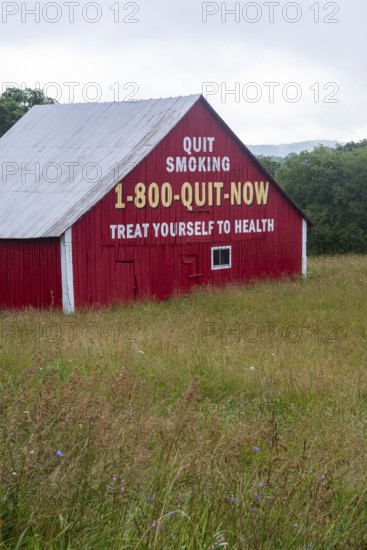 Marlinton, West Virginia - A barn in rural West Virginia is painted with an anti-smoking message. Treat Yourself to Health is a takeoff on Mail Pouch Tobacco's slogan that has decorated many barns in rural America: Treat Yourself to the Best