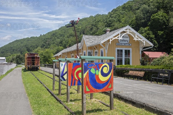 Marlinton, West Virginia - The Greenbrier River Trail runs past a restored train station which is now an art gallery. The biking and hiking trail, on the railbed of the former Chesapeake and Ohio Railway, runs 78 miles in eastern West Virginia