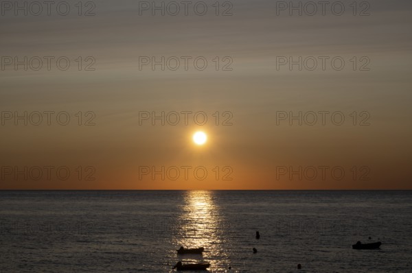Boats, sunset at the sea, evening mood, atmospheric, Étretat, Normandy, Seine-Maritime, France