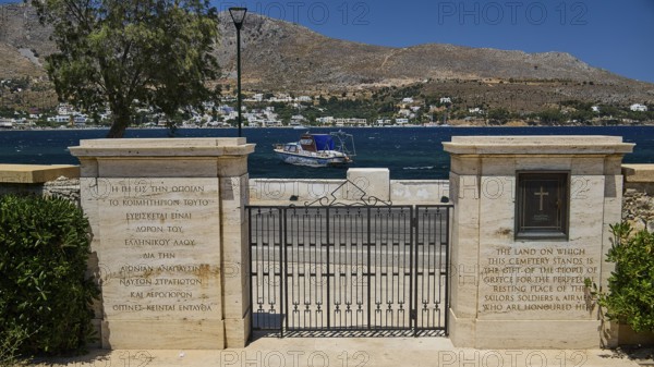 Stone gate of a cemetery with sea view and memorial inscription, mountains in the background, military cemetery, Commonwealth War Cemetery, military cemetery, WW2, 1939-1945, 179 graves, Alinda, Leros, Dodecanese, Greek Islands, Greece