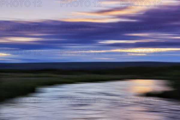 River landscape, evening sky, motion blur, light reflections, text free space, Iceland