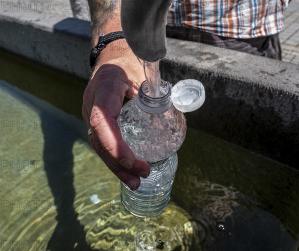 Drinking water supply at a public well, Bavaria, Germany