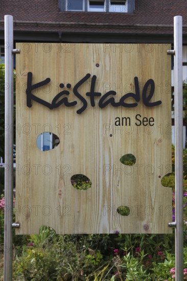 Wooden sign KäStadel am See, Kässtadel, specialist cheese shop with bistro, cheese shop, delicatessen, café, regional cuisine, small restaurant, refreshments, Oberuhldingen district, Uhldingen-Mühlhofen municipality, Lake Constance district, Baden-Württemberg, Germany