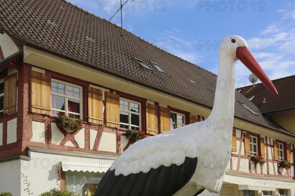 Hotel, Gasthof Storchen, restaurant, replica stork, large sculpture, half-timbered, building, wooden shutters, Oberuhldingen district, Uhldingen-Mühlhofen municipality, Lake Constance district, Baden-Württemberg, Germany