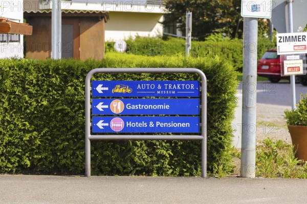 Sign, signpost, car and tractor museum, catering, hotels and guesthouses, arrow, writing, letters, Oberuhldingen district, Uhldingen-Mühlhofen municipality, Lake Constance district, Baden-Württemberg, Germany