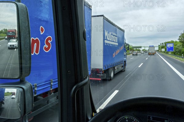 Overtaking manoeuvre, truck with trailer overtaken, following traffic in the rear-view mirror, A9 motorway near Ingolstadt, Upper Bavaria, Bavaria, Germany