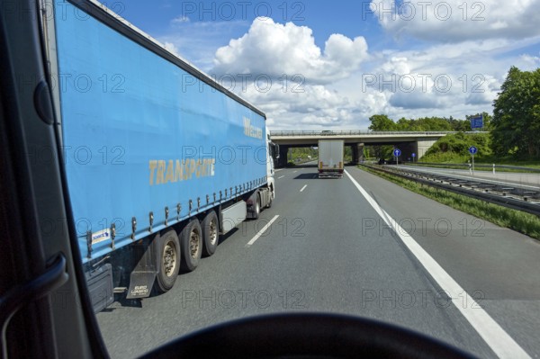Overtaking manoeuvre by articulated lorry, lorry overtaken, A3 motorway near Nuremberg, Middle Franconia, Franconia, Bavaria, Germany