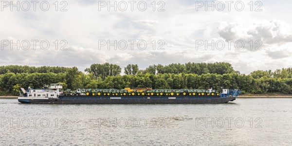 Ship loaded with tractors on the Rhine in Wiesbaden-Biebrich, Rhine navigation, Wiesbaden, Hesse, Germany