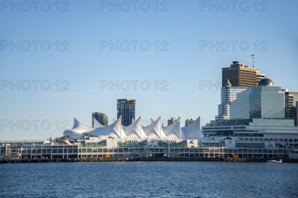 Skyline, skyscrapers and Canada Place on the promenade, Vancouver, British Columbia, Canada