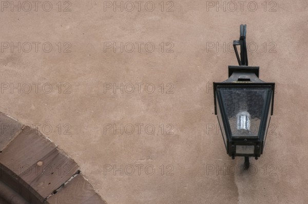 Street lamp on a historic building, Haguenau, Alsace
