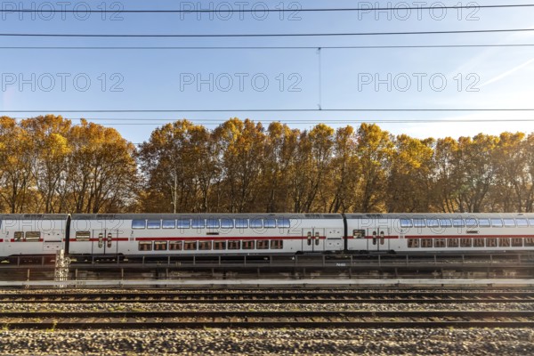 InterCity entering Stuttgart Central Station in autumn. Apron of the track. Stuttgart, Baden-Württemberg, Germany