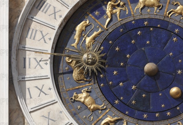 Torre dell'Orologio (1496-1506) on St Mark's Square (Piazza San Marco), the Astrological Clock Shows the Phases of the Moon, the Sun and the Signs of the Zodiac. The dial is made of lapis lazuli, Venice, Italy