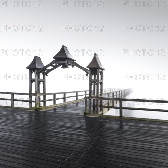 Seebrücke, Sellin, archway, with dock to the diving bell at dawn in Nebek, seaside resort Sellin, Rügen island, Mecklenburg-Western Pomerania, Germany