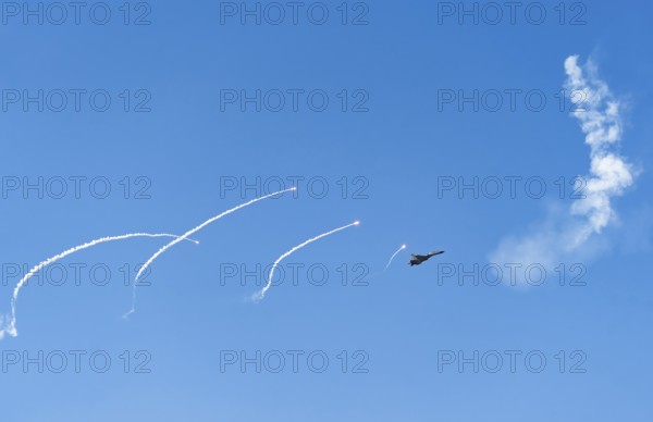 The Indian Air Force aerobatic team performs during an air show as part of the 93rd Air Force Day celebrations on November 8, 2025 in Guwahati, India