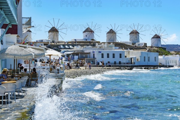 Mykonos, Cyclades, Greece - The six sixteenth-century windmills, lined up on a hill above Mykonos Town, Mykonos Chora, are the island's landmark. Mykonos is part of the Cyclades archipelago in the Aegean Sea