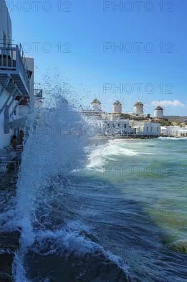 Mykonos, Cyclades, Greece - The six sixteenth-century windmills, lined up on a hill above Mykonos Town, Mykonos Chora, are the island's landmark. Mykonos is part of the Cyclades archipelago in the Aegean Sea