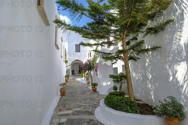 Ano Mera, Mykonos, Cyclades, Greece - The Panagia Tourliana monastery is the center of Ano Mera. The 16th century men's convent on the village square in the interior of the island is now a tourist attraction much visited by tourists