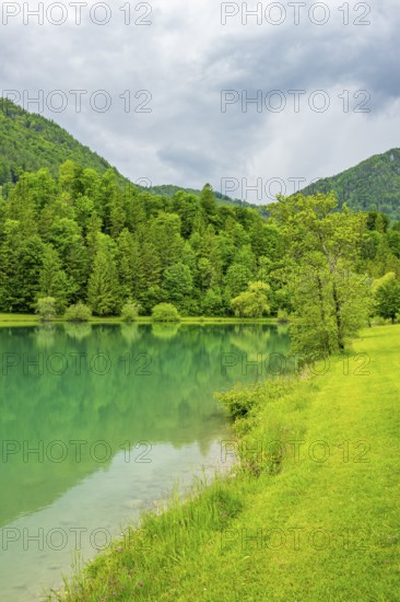 Landscape of Lake Elisabethsee on a rainy day in spring, Austria