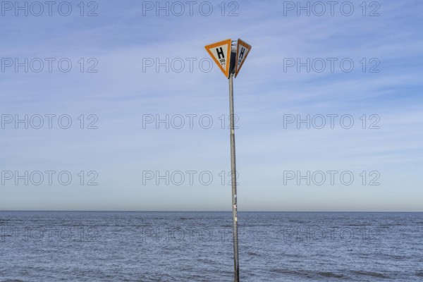 East Frisian North Sea island of Spiekeroog, Wadden Sea National Park, in winter, SOS, emergency call sign, east beach, beach section