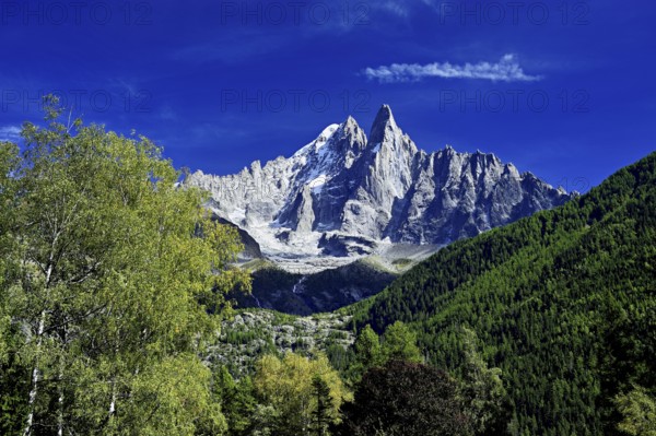From left, snow-covered Aiguille Verte, Aiguille du Dru, Chamonix-Mont-Blanc, Haute-Savoie, France