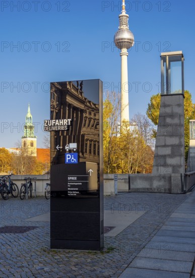 Black information columns with signs and signs on the forecourt of the Humboldt Forum Berlin, Germany
