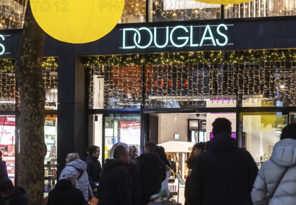 Douglas Perfumery branch in Königstraße Stutgart. Exterior view with neon sign and logo. Stuttgart, Baden-Württemberg, Germany
