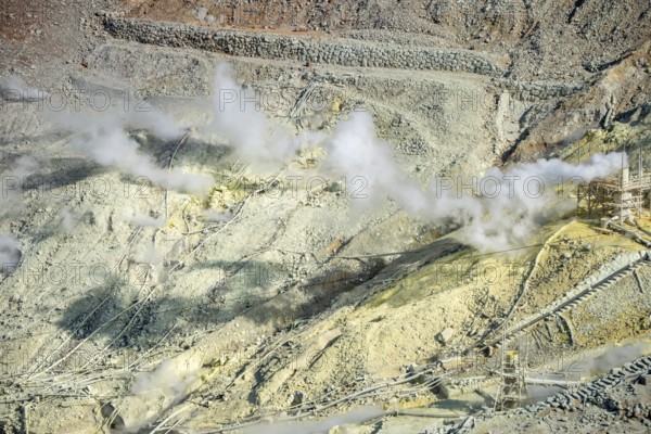Steaming fumaroles in the Owakudani geothermal area at Komagatake volcano, Hakone, Japan
