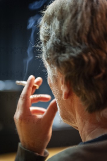 Man with cigarette, smoking, from behind, rear view, Germany