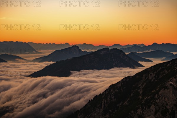 Alpine panorama at dusk, fog in the valley, Hochstaufen, Chiemgau Alps, Upper Bavaria, Bavaria, Germany
