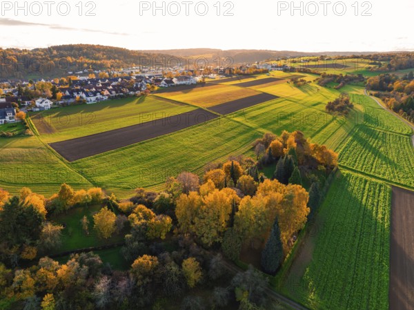 Panorama of fields and colorful autumn trees under wide sky, Aidlingen, Böblingen district, Germany