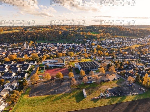 Village in a natural autumn landscape with warm colors, Aidlingen, Böblingen district, Germany