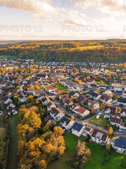 Panorama of a village with autumn trees and colorful roofs, natural beauty, Aidlingen, Böblingen district, Germany