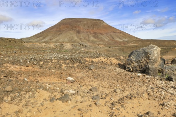 View of eroded volcano volcanic cone partially eroded by erosion in volcanic landscape Volcanic landscape, Fuerteventura, Canary Islands, Spain