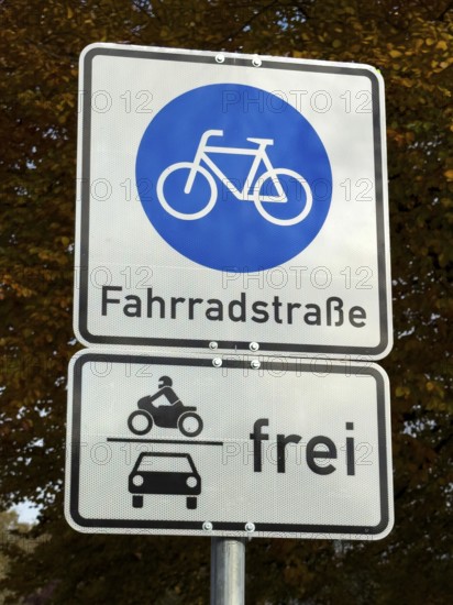 Above road sign 244.1 bicycle road at the beginning of a road intended for cycling, including additional signs for permitted use of motorcycles and motor vehicles, Germany