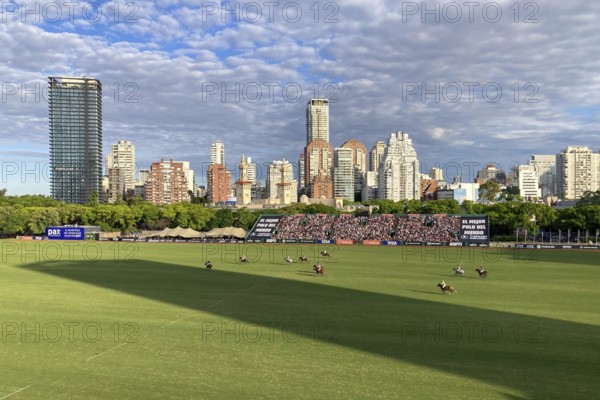 Scene at the 132nd Argentine Open Polo Championship (Spanish Campeonato Argentino Abierto de Polo), UAE Polo versus Sol de Agosto, with the skyline of Buenos Aires, Argentina