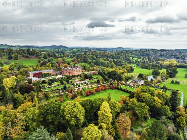 Autumn colours over Powis Castle and Garden from drone, Welshpool, Powys, Wales, England, United Kingdom