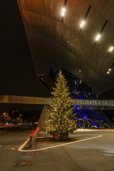 Illuminated Christmas tree in front of BMW World, Petuelring, Munich, Upper Bavaria, Bavaria, Germany