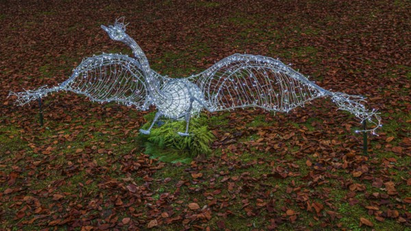 Swan made of wire and fairy lights, on leafy meadow, Historisches Hotel La Villa, Niederpöcking, Upper Bavaria, Bavaria, Germany