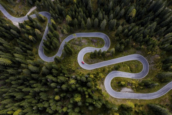 Curvy road, serpentines, pass road, forest, aerial view, car, red, Giau Pass, Dolomites, Italy