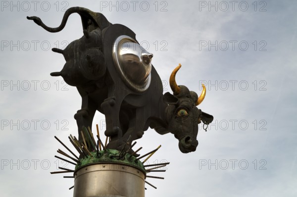 Fountain in the shape of a cow on a milk can, cow riosum sculpture, by Jürgen Görtz, Bietigheim-Bissingen, Baden-Württemberg, Germany