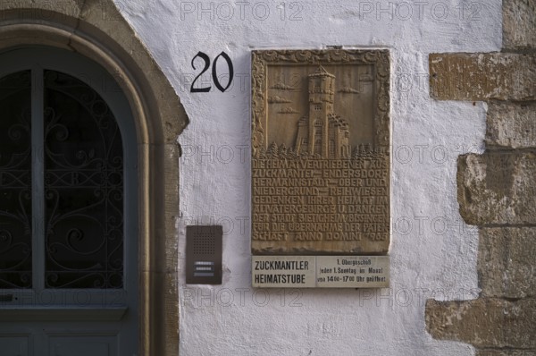 Wall plaque, entrance to Zuckmantler Heimatstube, museum, Bietigheim-Bissingen, Baden-Württemberg, Germany