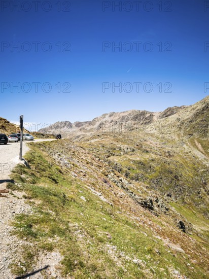 View of the high-alpine mountain landscape at the Timmelsjoch rest house on the border between Italy and Austria, above moss, South Tyrol, Italy, for editorial use only