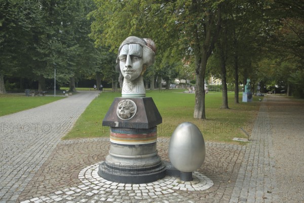 Archivia sculpture by Jürgen Görtz 1992, modern art, head, bizarre, egg, path, castle park, Eichtersheim, Angelbachtal, Kraichgau, Baden-Württemberg, Germany