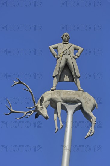 Friedrich Hölderlin sculpture by Peter Lenk 2003, modern art, Duke of Württemberg Karl Eugen, Württembergish, deer figure, above, standing, heroic, pole, beam, figure, roundabout, Lauffen am Neckar, Neckar Valley, Baden-Württemberg, Germany