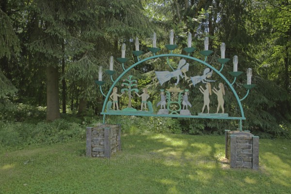 Traditional candle arch with angels and figures, forest, candles, Johanngeorgenstadt, Western Ore Mountains, Ore Mountains, Saxony, Germany